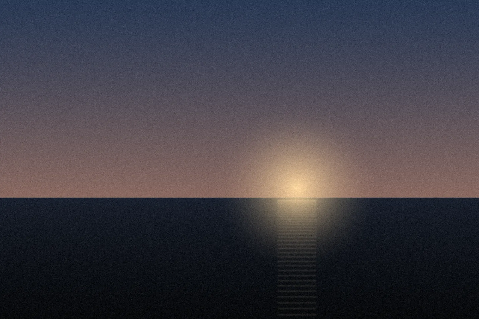 Dusk over a dark sea with a low sun
