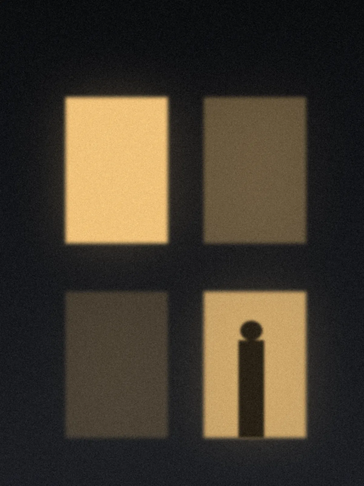 Lit windows in a dark building with a figure in one