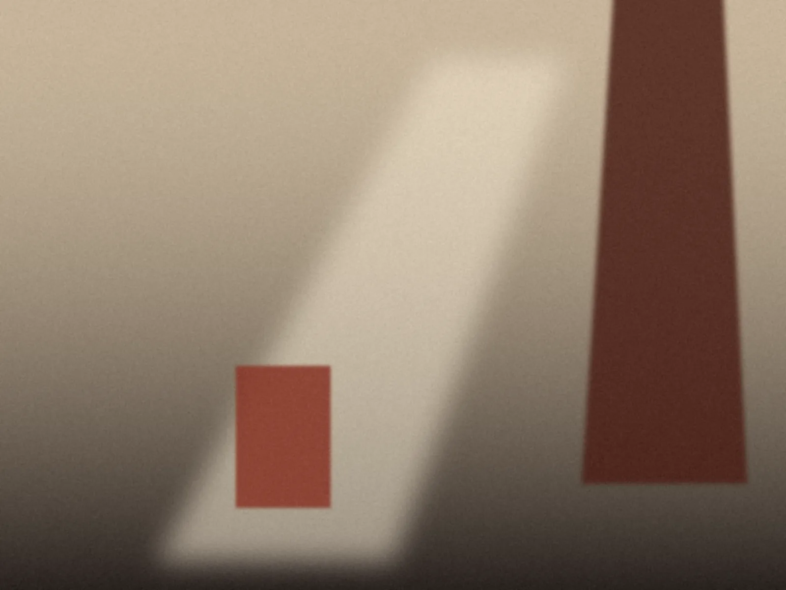A red block and drape in a warm room